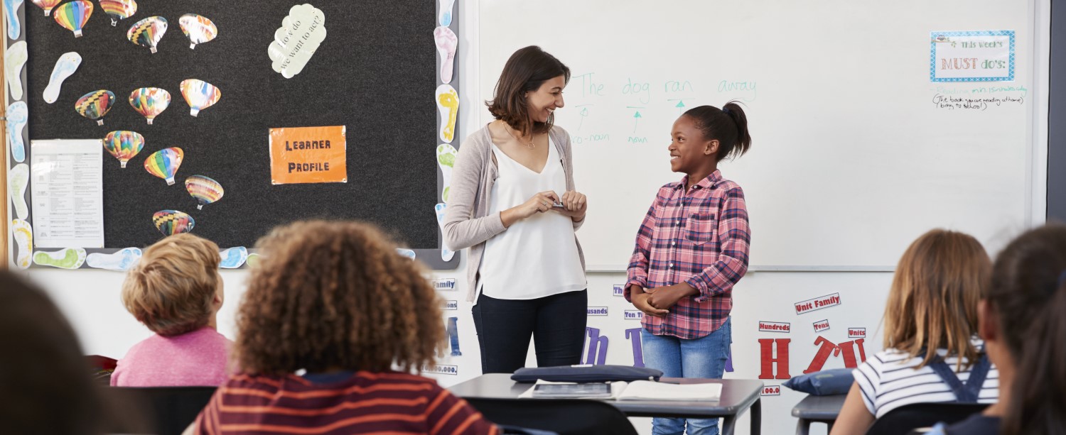 /getmedia/d72ffa9a-fbcd-4034-aa6a-e35a092c8eb7/Academic-Freedom-teacher-and-pupil-stand-at-front-of-elementary-sch-PAC3V7K.jpg?width=1500&amp;height=613&amp;ext=.jpg